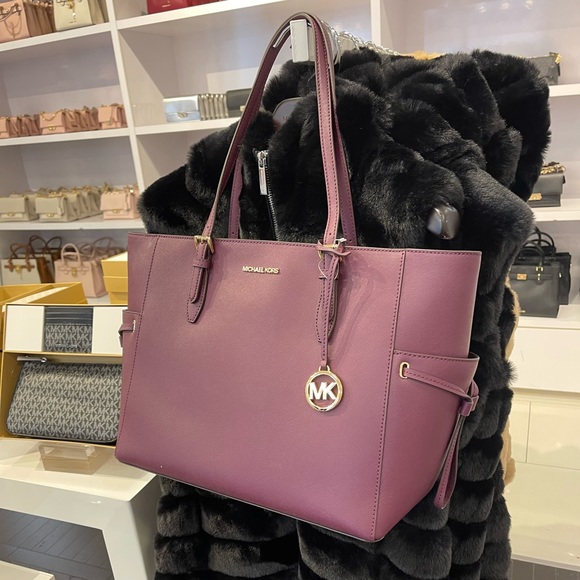 Michael Kors Gilly Large Drawstring Travel Leather Top Zip Tote 
Oxblood Color - Picture 4 of 16